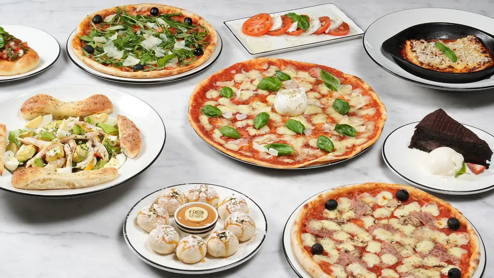 PizzaExpress Marks 60 Years with Anniversary Specials Across UAE The iconic pizza chain, a familiar sight in the UAE for over two decades, celebrates its diamond jubilee with a series of special offers and a nostalgic menu revisiting its classic dishes.