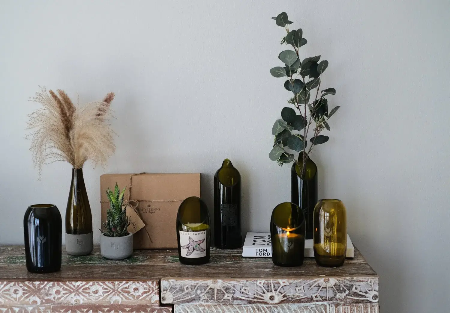Discover Kattys' Designs, a Dubai studio by Ekaterina Penkovskaya, transforming discarded wine bottles into elegant, sustainable homeware with a zero-waste vision.