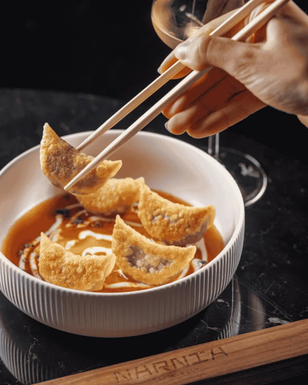 Narnia's inventive menu offers surprises like sushi without rice, and fish with white asparagus and cauliflower rice. Desserts include wagashi mochi and coconut “udon” pasta. Each dish pushes creative boundaries.