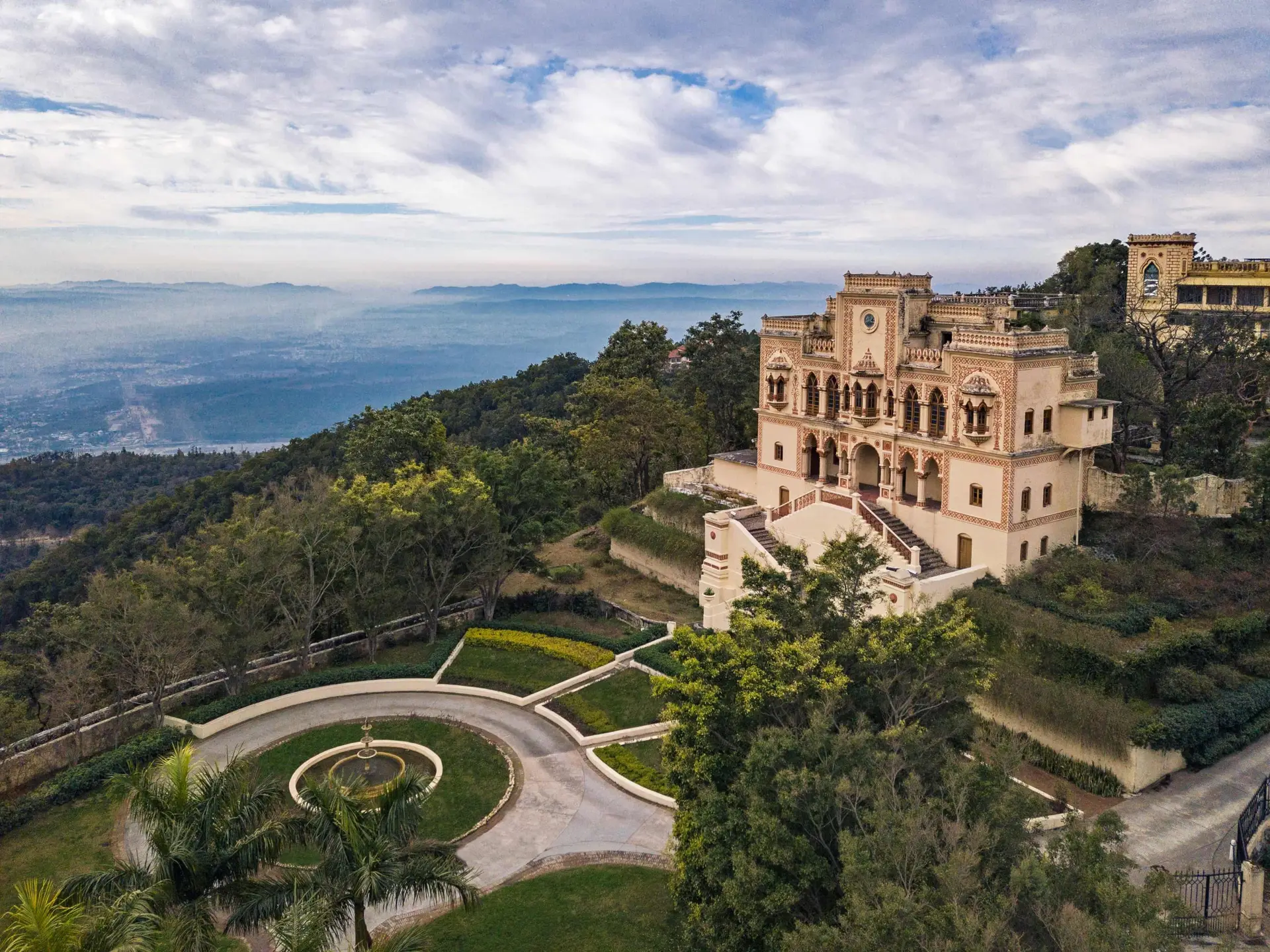 Discover four hotels around the world, from Amsterdam to India, that are redefining luxury by using adaptive reuse to transform historical landmarks into unique, sustainable, and culturally rich guest experiences.