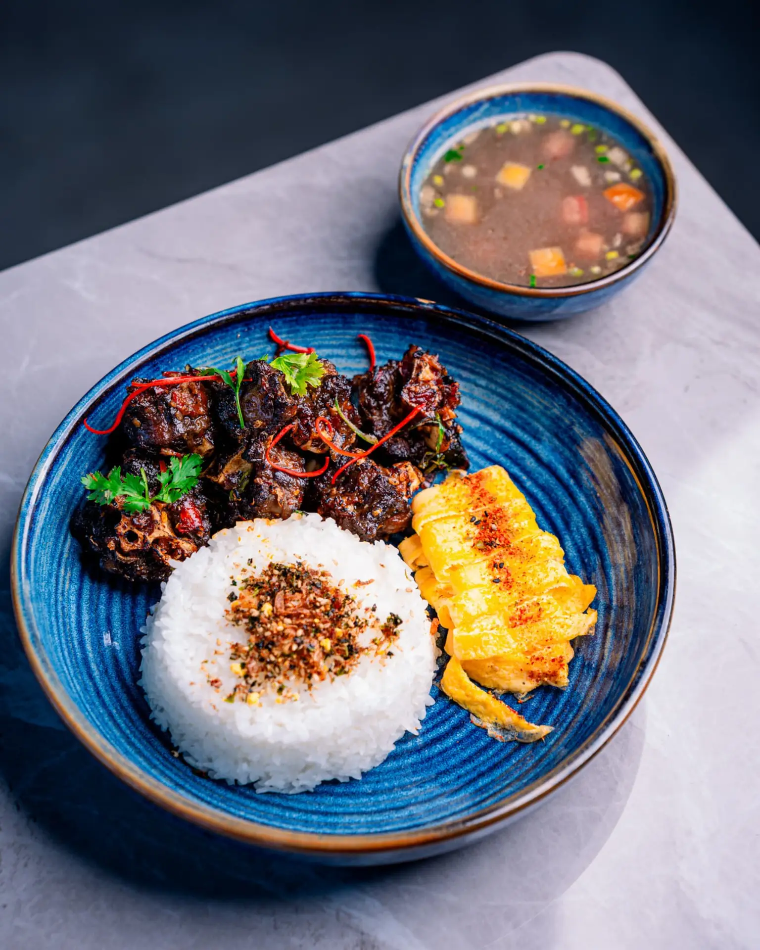 Dubai Indonesian restaurant Bobi Bowl blends traditional rice bowls with fine-dining techniques. Read more on Hotels of UAE