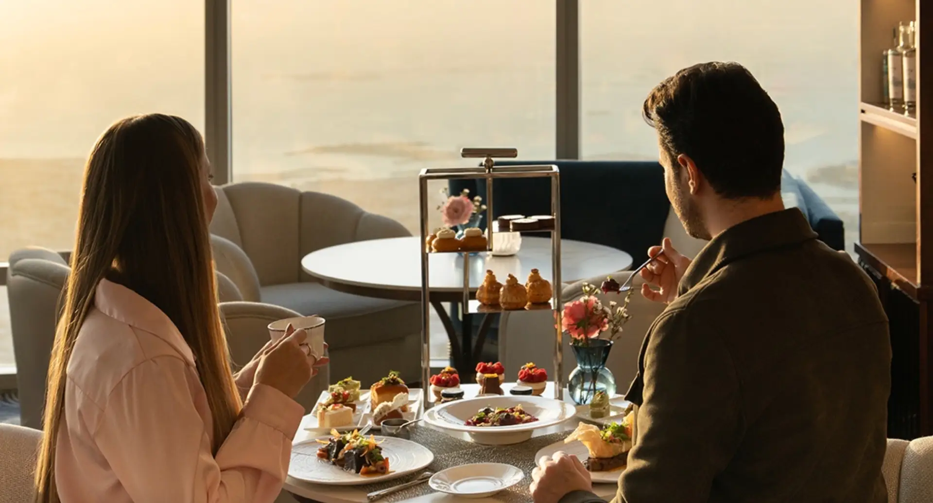 Few afternoon teas come with a view like this one. At.mosphere Lounge serves the ritual 442 metres up, on Level 122 of the Burj Khalifa, with mini sandwiches, freshly baked scones and a spread of cakes and pastries to match the scenery. There are three ways to do it. La Gourmandise, at AED 350 per person, gets you the full spread with unlimited hot and cold drinks. Sparkling High Tea steps it up with two glasses of Prosecco each, at AED 550. And for something more celebratory, Luxurious High Tea includes a bottle of champagne for two and a main course alongside the full selection, at AED 850. Served daily from 12:30pm to 4:30pm.